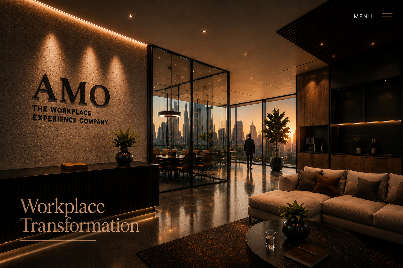AMO — The Workplace Experience Company. Workplace Transformation. A warm-lit lobby with amber uplighting overlooking a sunset cityscape.